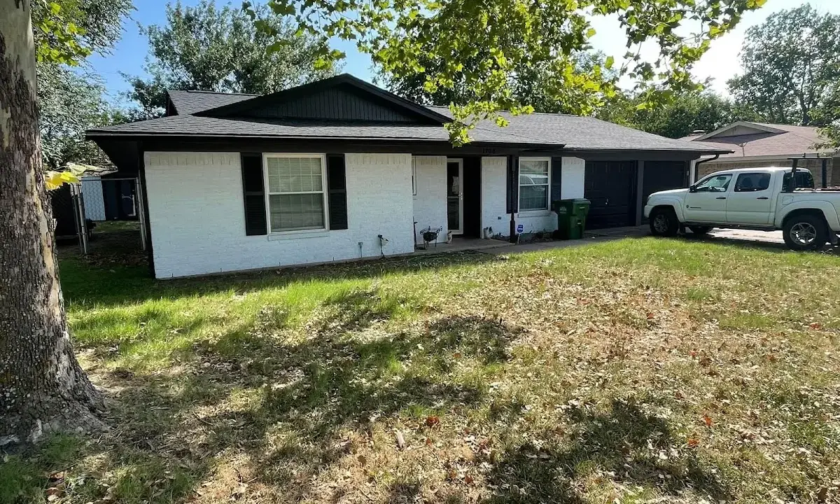 Professional roofing crew working on a residential roof in Ben Lomond